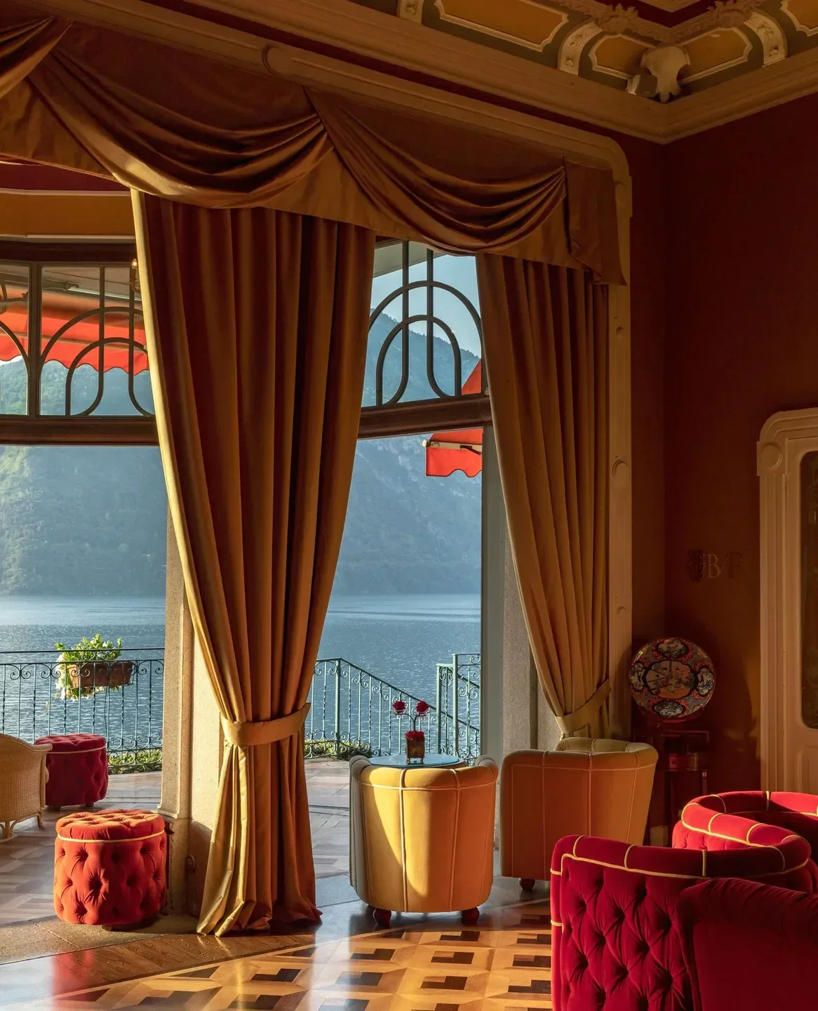 Interior of La Terrazza Gualtiero Marchesi restaurant overlooking Lake Como's scenic beauty