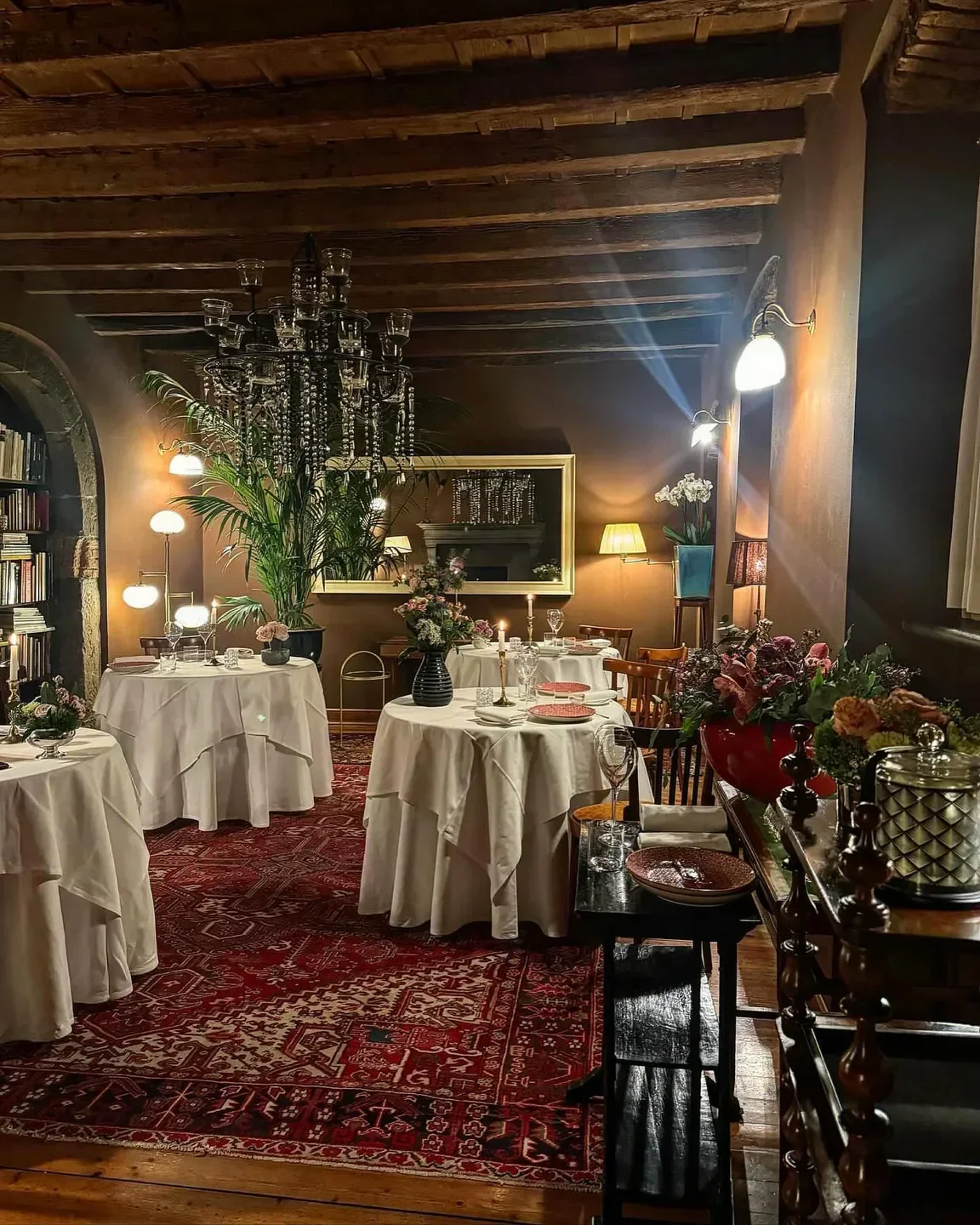 Cozy dining room at Osteria della Brughiera in Lake Como with elegant decor and setting.